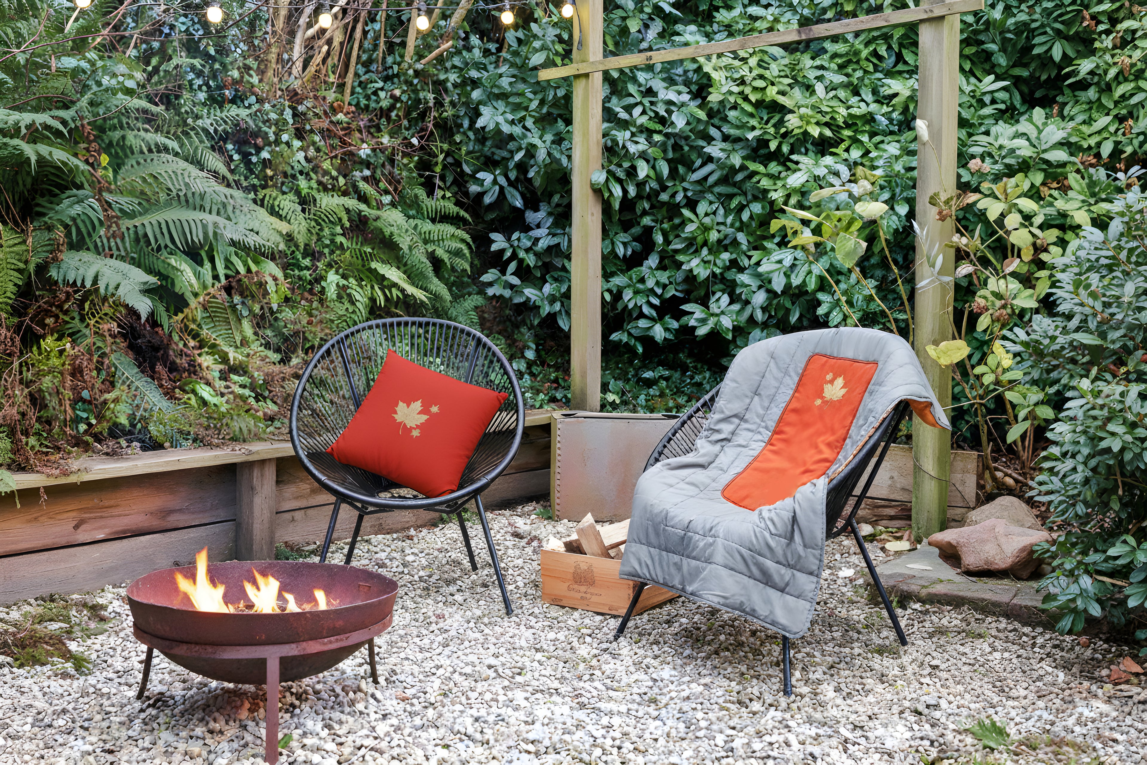 Close-up leaf pattern fabric on Mecks 2 in 1 cushion blanket